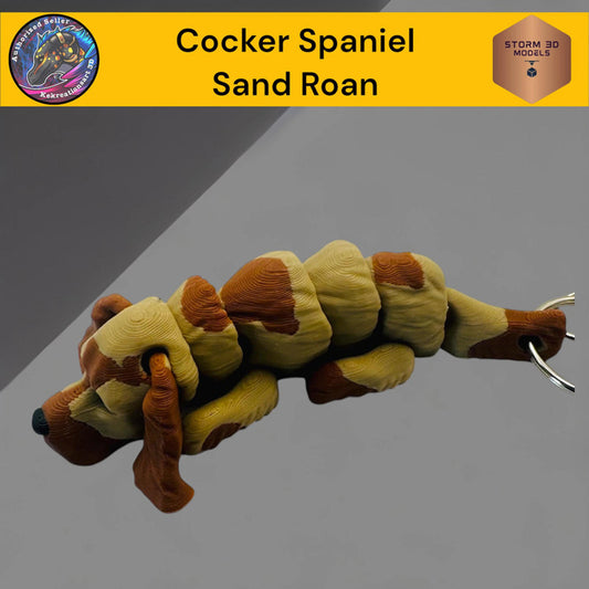 Dog toy resembling a Cocker Spaniel in sand roan color on a gray background