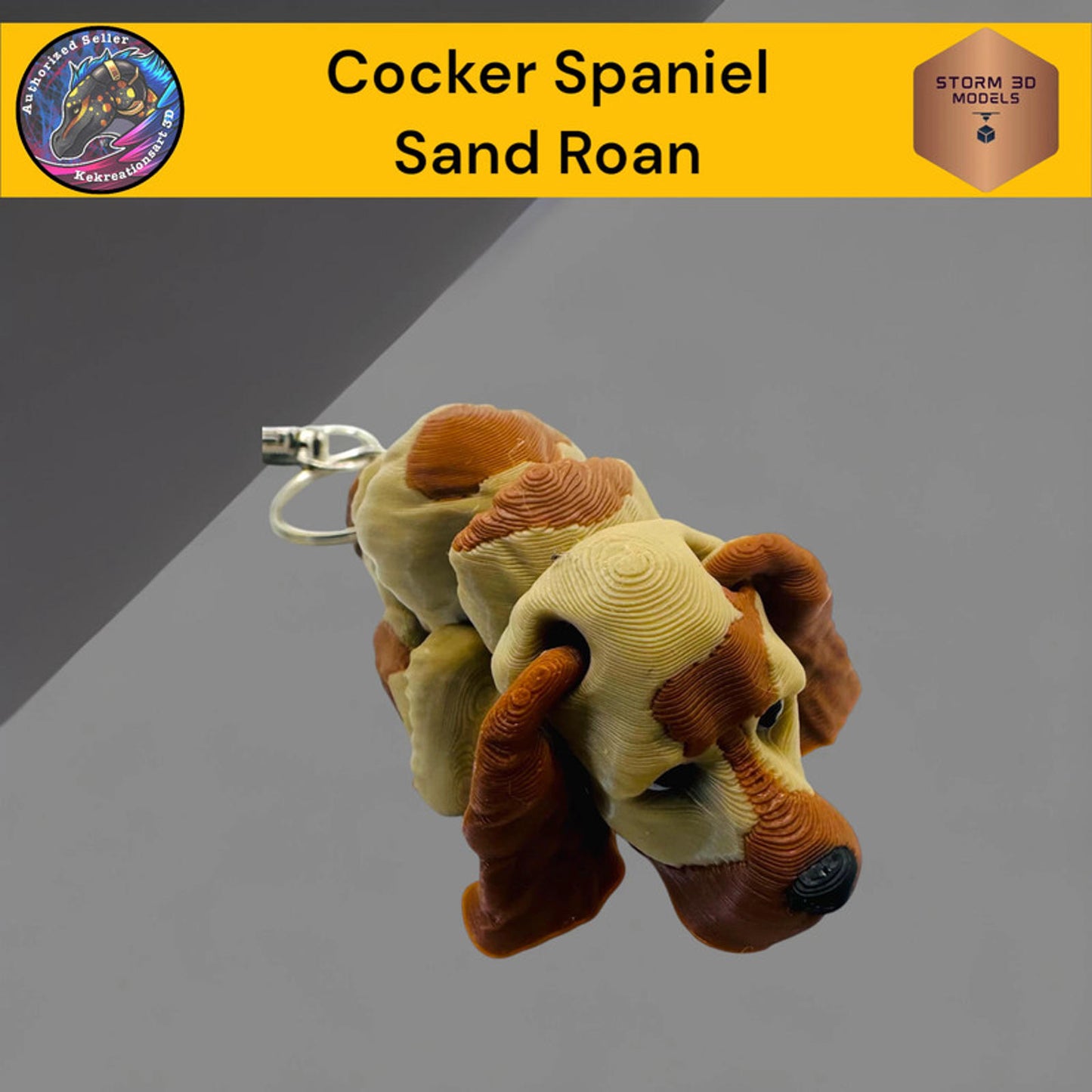 Cocker Spaniel Sand Roan keychain on a gray background with branding elements.