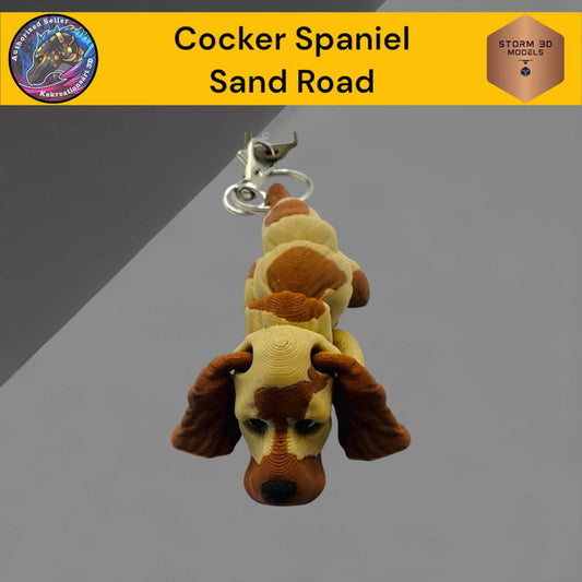 Cocker Spaniel keychain on a gray background with 'Storm 3D Models' branding.